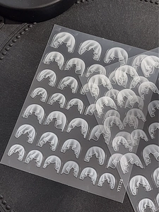 Macro shot of YT5128 translucent white relief gauze lace nail art stickers with pleats