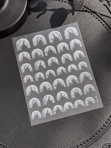 Detailed 3D embossed white lace nail art stickers with elegant floral relief textures