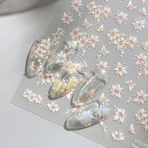 3D floral nail art stickers featuring pink cherry blossoms and butterflies on fake nails