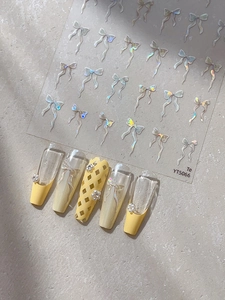Autocollants ongles nœuds 3D irisés et faux ongles finis avec design jaune YT5066