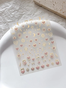 Détails d'autocollants nail art avec étoiles dorées, cœurs roses et motifs de lune YT4951