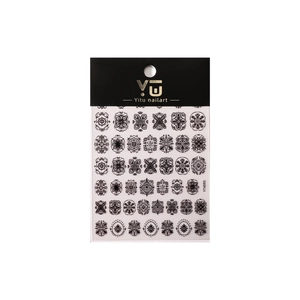 Relief Bohemian nail art stickers featuring black mandala and floral patterns on white background