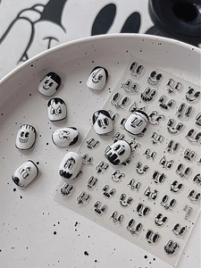 Detailed retro black and white cartoon facial expression nail stickers on false nails