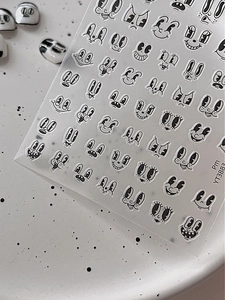 Detail of YT3883 black and white retro cartoon nail stickers with adhesive backing