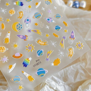 Space-themed nail stickers with cartoon astronauts, rockets, and stars for nail decoration