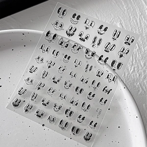 Cute retro cartoon facial expression nail art stickers YT3883 on a white ceramic plate