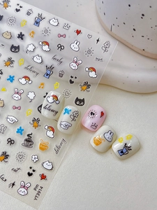 Macro detail of YT3914 nail art stickers featuring cute rabbits, cats and floral patterns