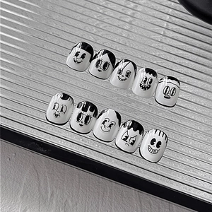 Hand-painted retro cartoon expression nail stickers in black and white finish