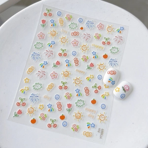 Cartoon nail stickers with colorful fruit, sun, and flower patterns on clear backgrounds