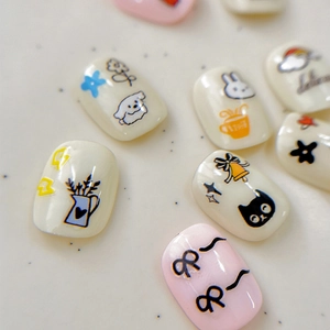 Cute cartoon nail stickers featuring rabbits, bowknots and flowers on cream base