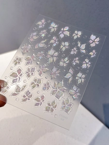 Iridescent lily and butterfly nail art stickers with laser holographic finish