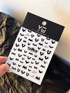 Detailed sheet of Halloween bat nail stickers with Happy Halloween text and designs