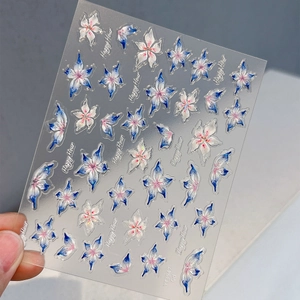 Autocollants nail art 3D en relief avec fleurs et papillons bleu et blanc irisés