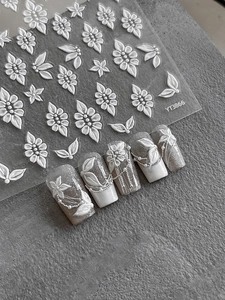 Detailed 5D embossed white flower nail stickers and 3D floral petal nail art decals