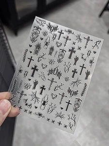 Gothic nail art stickers with spider, cross, and coffin motifs in 5D embossed style