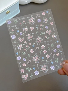 Detailed 5D embossed flower nail stickers with pastel floral patterns and 3D texture