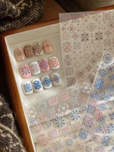 Detailed macro view of 5D embossed Bohemian mandala nail stickers with vintage patterns