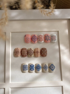 Detail view of 5D embossed bohemian nail art stickers in floral and ethnic patterns