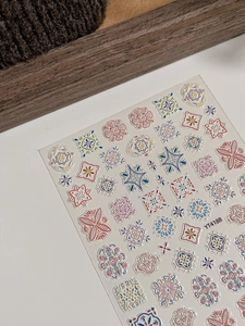 Close-up of bohemian 5D embossed nail stickers with ethnic geometric patterns on YT4188 sheet