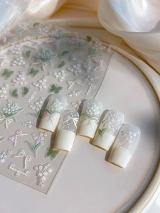 Detail of YT4111 5D embossed nail stickers with lily of the valley and bow designs
