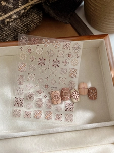 Detailed view of bohemian mandala nail stickers with 5D embossed floral patterns