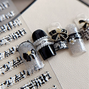 3D bow and pearl embossed press-on nail art set with black and silver festive designs