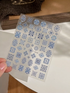 Detailed view of YT4185 blue and white bohemian embossed nail art stickers with floral patterns
