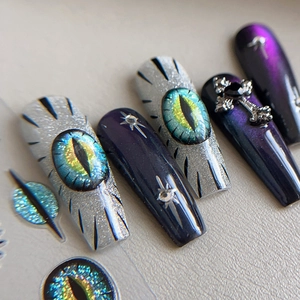 Gothic long coffin press-on nails with purple cat eye stones and silver crosses