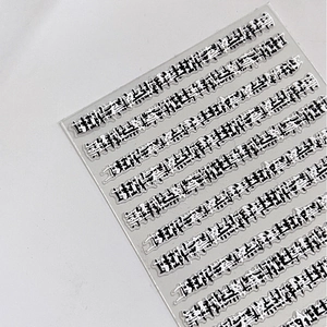 Embossed art nail stickers with fabric style relief patterns on a transparent board