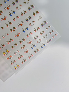 Detail shot of cute cartoon face nail art stickers YT3904 with various colorful expressions