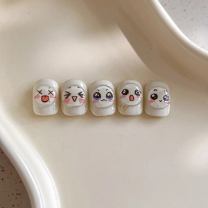 Cute cartoon emoji nail art stickers with 3D embossed facial expressions on white base