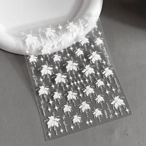 Stickers à ongles relief 3D fleurs blanches et motifs botaniques sur base transparente