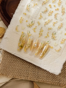 Detail of YT4265 nail stickers with embossed golden osmanthus and butterfly accents