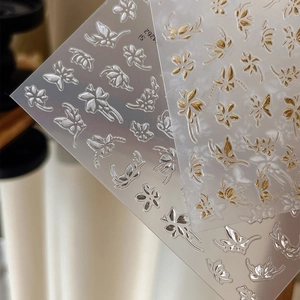 Stickers nail art relief 3D papillon et fleur avec finition métallique or et argent