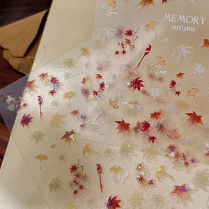 Iridescent autumn maple leaf nail stickers with 3D embossed colorful foliage designs