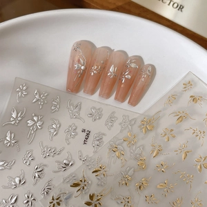Autocollants à ongles papillon et fleurs dorés et argentés avec texture en relief