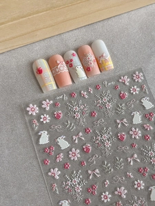 5D embossed nail stickers featuring 3D rabbits, flower bouquets, and bowknot designs