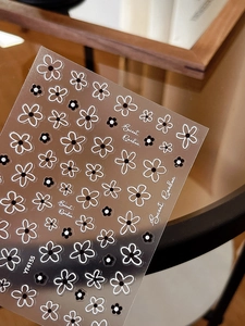 Detailed view of YT4155 Secret Garden floral nail art stickers with black and white petals