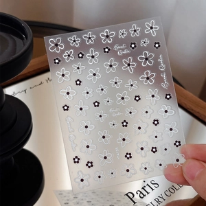 Secret Garden floral nail art stickers with black and white hollow five-petal flower patterns