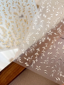 Detailed view of gold and silver metallic vine and leaf nail art stickers with YT4098 code