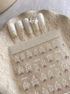 Détails de stickers nail art dorés fleurs et nœuds avec effet perles et strass 3D