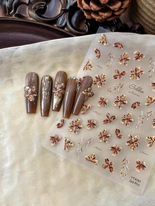 Detail of YT4161 golden autumn floral nail stickers with embossed 3D flower textures
