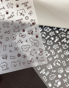 Detail of YT4468 transparent nail stickers with brown puppy, rabbit, and bow patterns