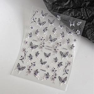Self-adhesive embossed butterfly and hibiscus flower nail art stickers in blue tones