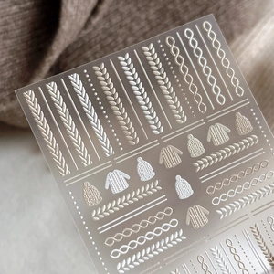 Autocollants nail art gaufrés 5D avec motifs de pull et bonnet en tricot 3D blanc et beige