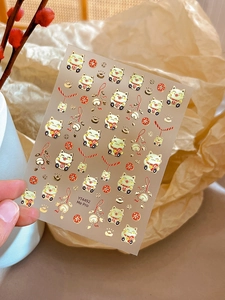 Detail of YT4492 gold foil Maneki Neko nail stickers with lucky cat and coin designs