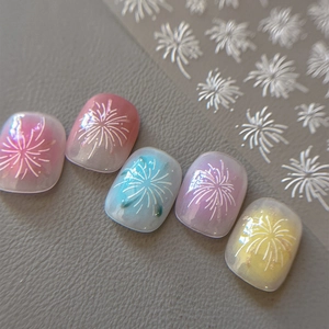 Embossed white firework nail stickers with fine lines applied on aurora pearl nails