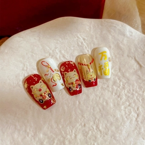 Golden Maneki Neko nail art stickers with red and gold festive New Year designs