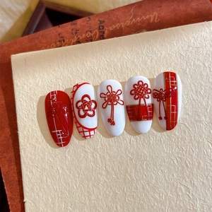 Embossed Chinese knot nail art stickers with red and white floral patterns and gold lines