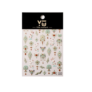 Gold bronzing lotus nail art stickers with traditional Chinese patterns on white background